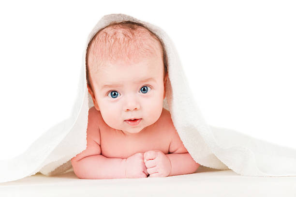 istock beautiful baby with a towel 153974361