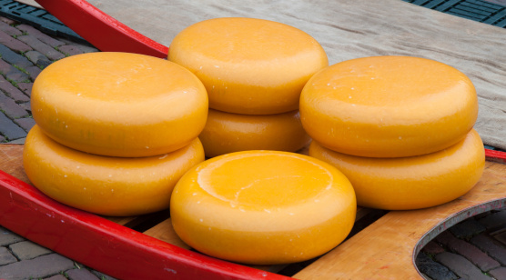 This is an image of a stack of Dutch cheese at the Alkmaar cheese market in The Netherlands.