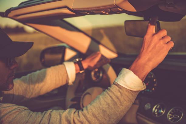istock Wealthy Caucasian Man in His Cabriolet 1539754667