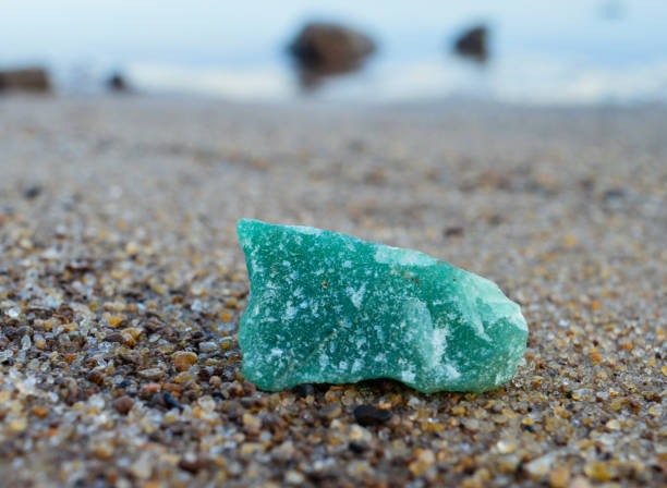 istock Green quartz mineral on beach 1539771710
