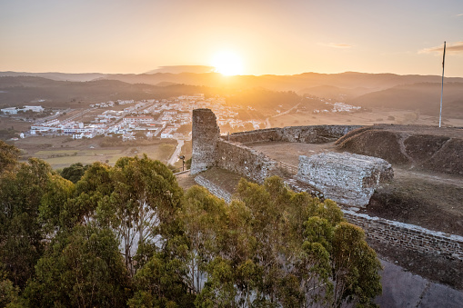 October3, 2020 - Aljezur, Portugal:  aerial view of Castle ruins of Aljezur early in the morning with the sun rising, Algarve