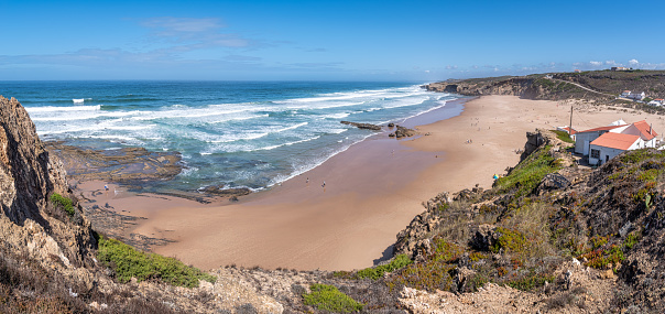 View of Praia de Monte Clerigo beach in Aljezur, Vicentine Coast, Algarve, in a sunny day. Portugal