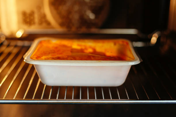 A ready meal - in this case a chicken curry - in the microwave at home.