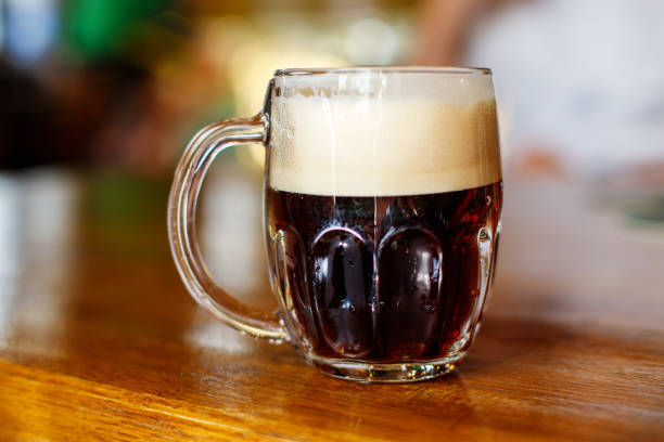 istock dark beer in a beer mug. Czech beer 1539826780