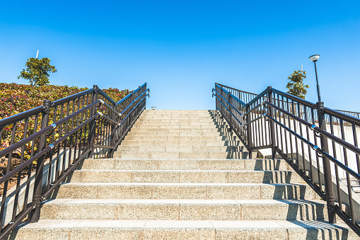 Small business opportunity and solutions as big stairs with tiny staircase as a success pathway for smaller companies or individuals with 3D illustration elements.