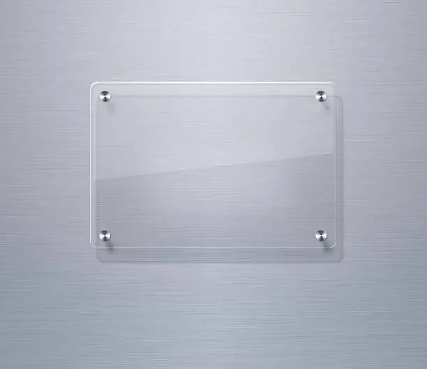 Blank glass plate over stainless steel background