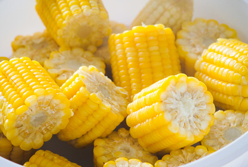 A bowl with cooked corn. São João traditional food in Brazil.