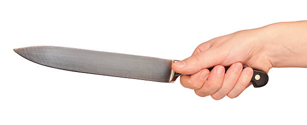 Knife in a hand stock photo