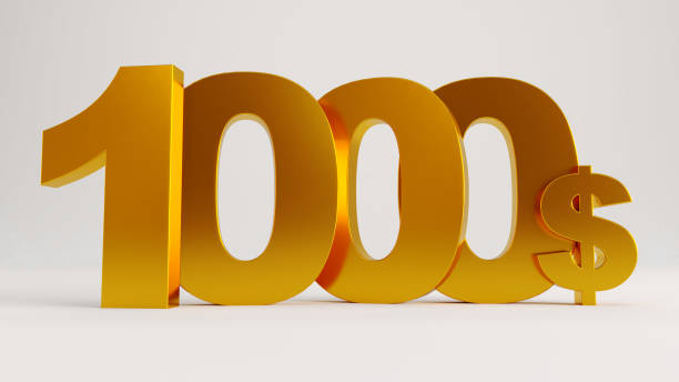 istock golden one thousand dollars isolated on white background, 1539875365