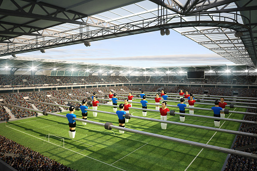 3d rendering of a soccer stadium with table soccer players on the playing field