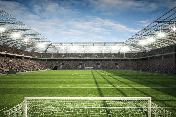 istock Soccer stadium with goal in the foreground 1539961932