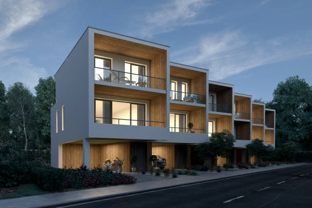 istock Modern town houses with garage in the evening 1539961941