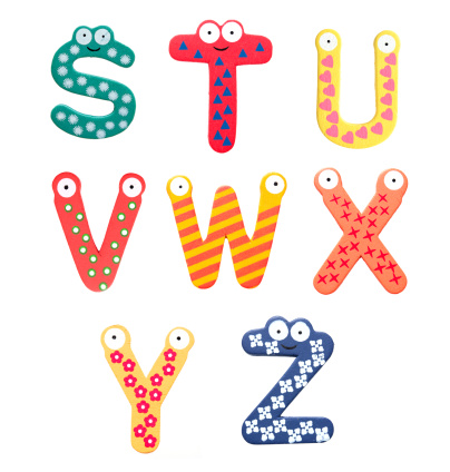 Multicolor alphabet fridge magnet letters (S-Z) isolated on white background