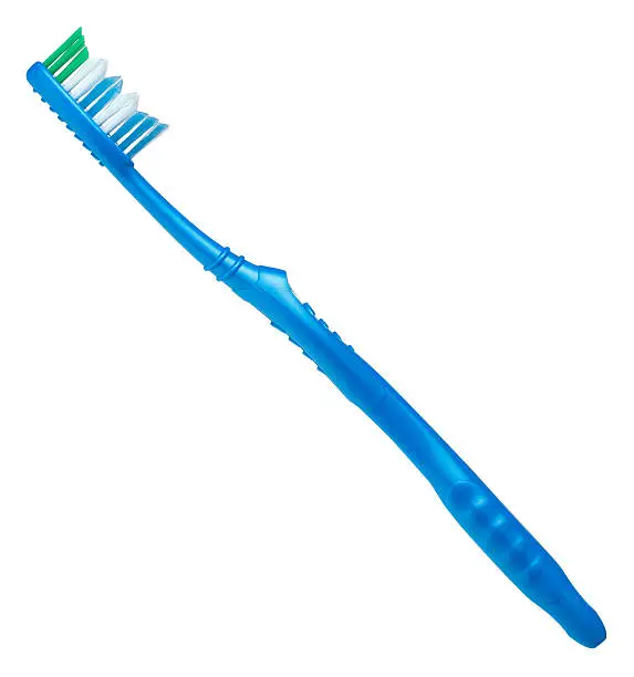 Photo of Blue toothbrush on a white background