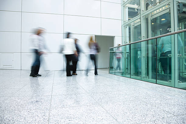 istock Businesswomen walking in a modern interior 153999570