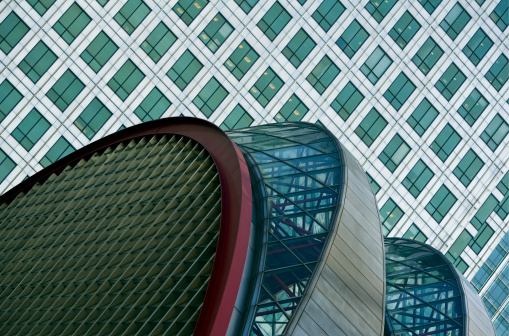 modern roof of the railway station in front of an office tower, Docklands, Canary Wharf, London, England