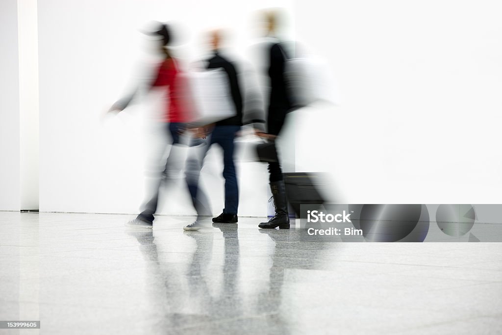 Blurred Young Travellers young travelers walking in a corridor, motion blur People Stock Photo