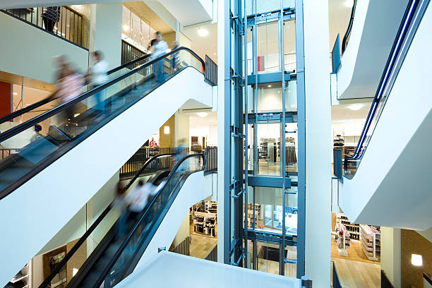 istock Escalators and elevator in shopping center 153999707