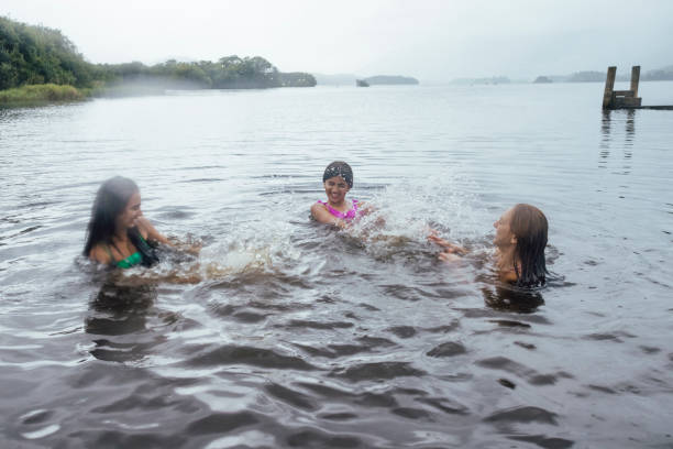 istock Mother and Daughters Wild Swimming 1540011308