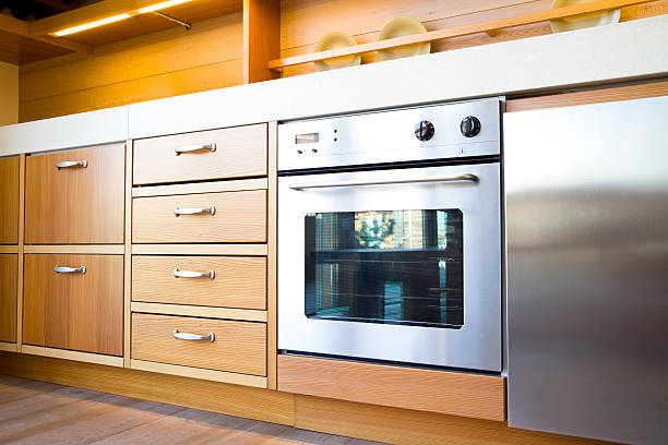istock Wooden kitchen with stainless steel cooker 154001486
