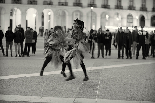 Lisbon, Portugal - December 17, 2022: African dancers perform at the Praça do Comércio square in Lisbon downtown.