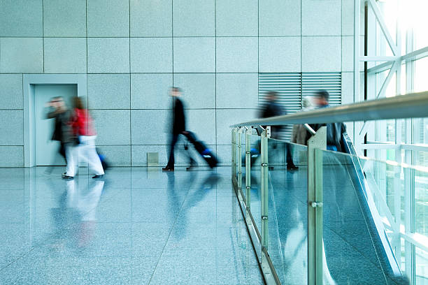istock Passengers Walking at Airport, Blurred Motion 154002418