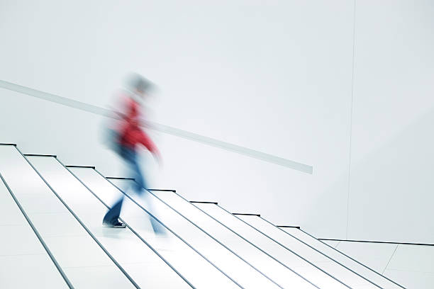 istock Women Walking Downstairs, Blurred Motion 154002847