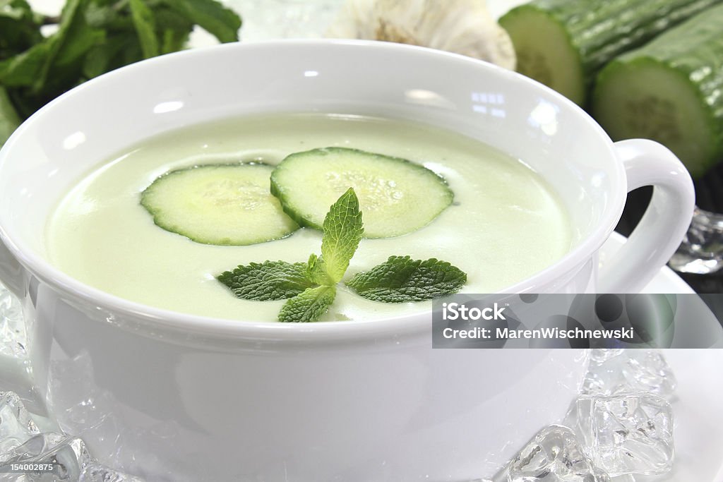 iced cucumber soup with garlic fresh iced cucumber soup with garlic, yogurt and peppermint Cucumber Soup Stock Photo