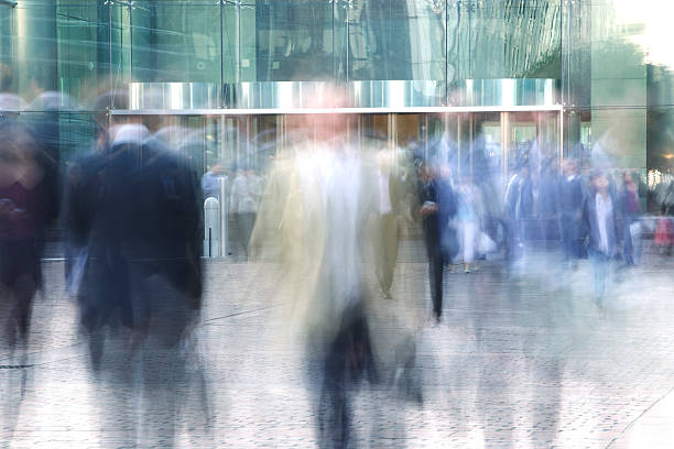 istock Blurred Business People Entering and Leaving Office Building 154002891
