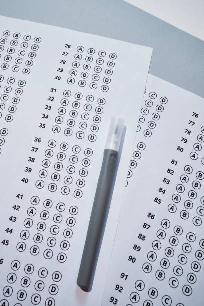 istock Admission test. Examination form. Choosing the correct answer. A sheet of paper with a test task. School exam. University quiz. Right or wrong option. Student to study. Elementary school question. Scoring and result 1540032411