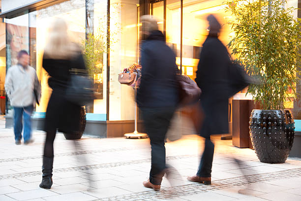 istock Blurred People Walking down Shopping Street 154003364