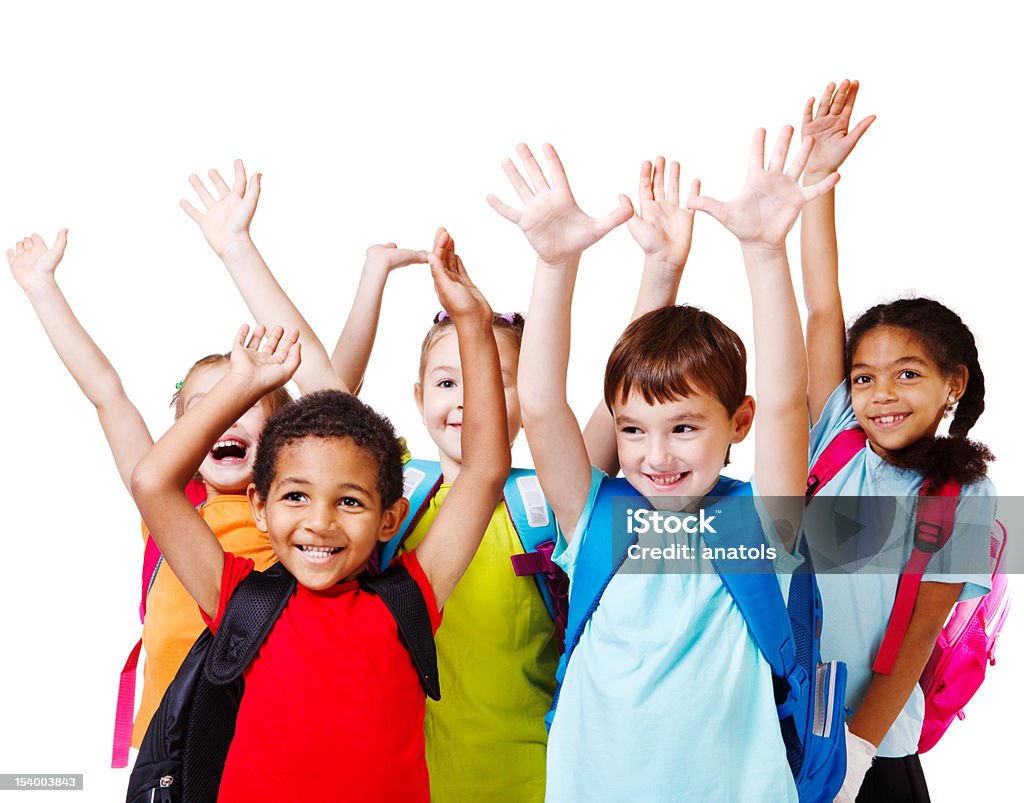 Children with backpacks holding their hands in the air Five happy children with their hands up Backpack Stock Photo