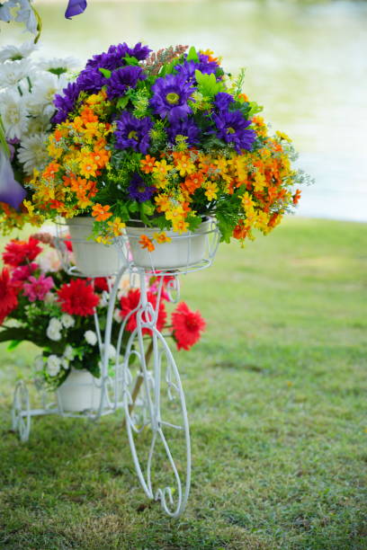 Close-up of the artificial  yellow flower in the basket bike