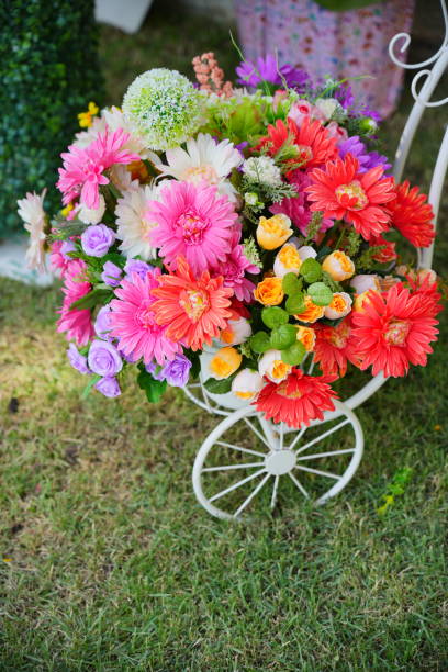 Close-up of the artificial flower in the basket bike
