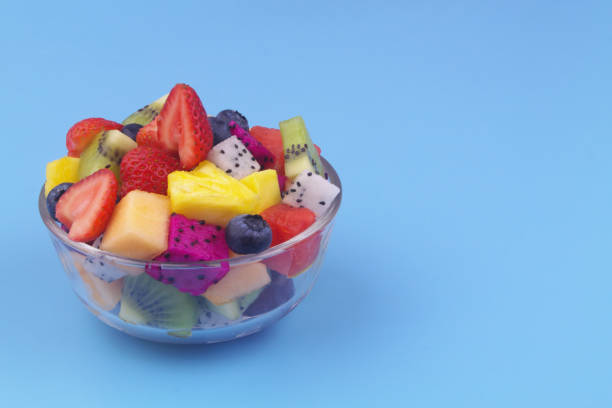 istock Fruit salad in glass bowl with copy space 1540078587
