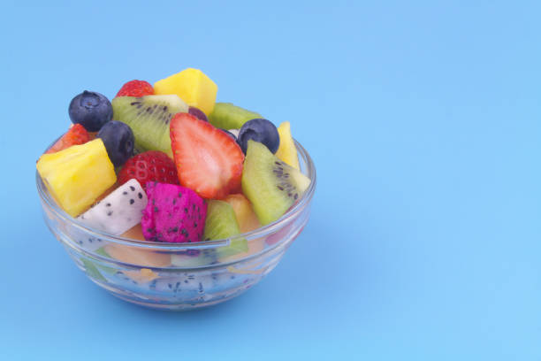 istock Fruit salad in glass bowl with copy space 1540079119
