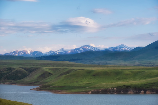 Bestyubinsk reservoir or Bestobe, water storage on the Charyn river in Kazakhstan, Beautiful lake landscape in the mountains