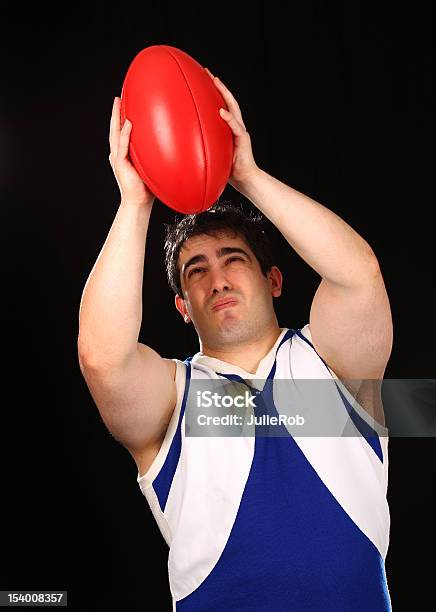 Confederação Sindical Afl Marcas A Bola De Jogador De Futebol - Fotografias de stock e mais imagens de Futebol Australiano