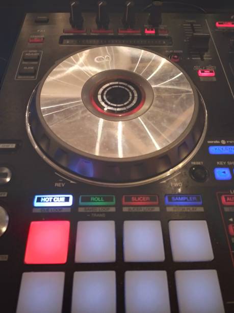 istock dj console, buttons for mixing music 1540091643