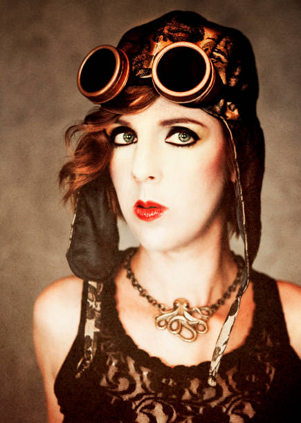 Beautiful woman wearing steampunk styled clothing and necklace. Stylized with grunge effect, please zoom in for details.
