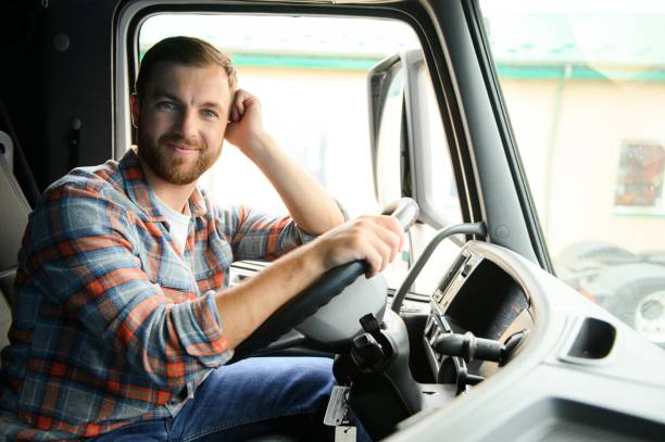 istock driver behind the wheel in truck cabin 1540100441