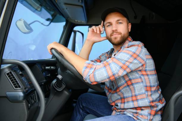 istock driver behind the wheel in truck cabin 1540103083