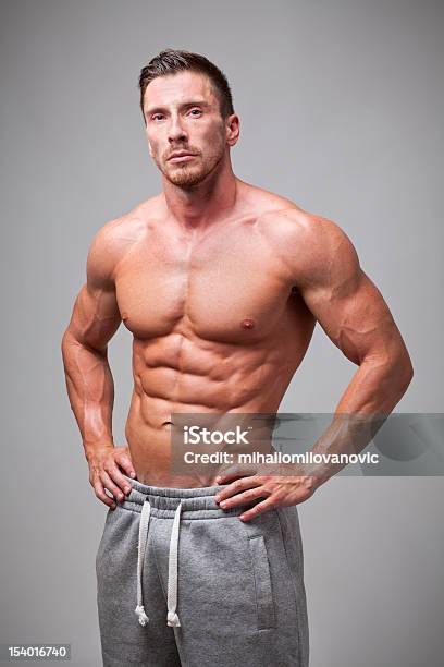 Handsome Man Stock Photo - Download Image Now - Abdomen, Abdominal Muscle, Adult