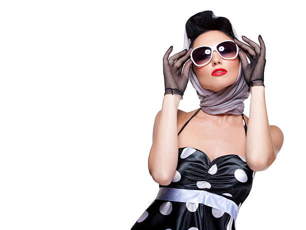 Brunette with stylish sunglasses and scarf young beautiful caucasian woman posing, isolated over white, retro styling, space for copy pics for classic pin up poses stock pictures, royalty-free photos & images