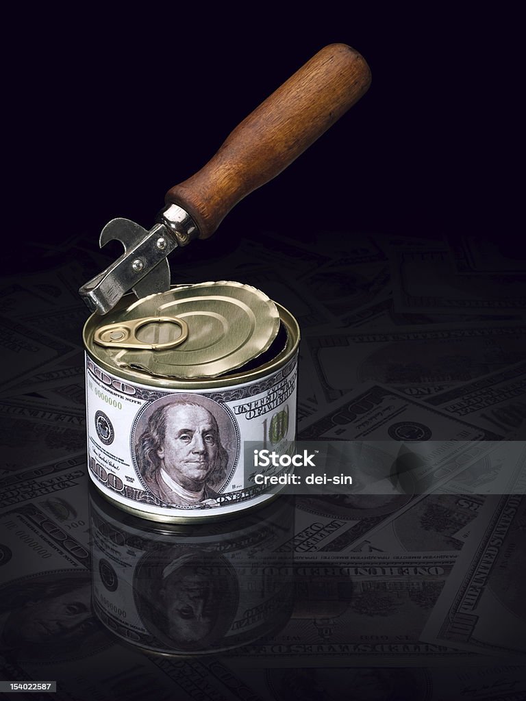 Bank account opening. Can-opener and tin box with money of the USA. Black Background Stock Photo