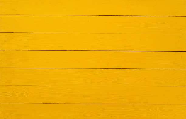 istock Bright yellow wooden planks background top view 1540258666