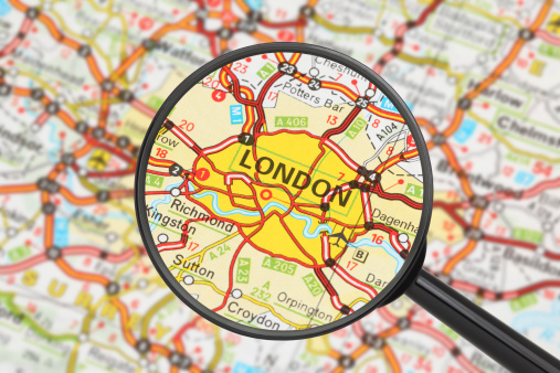 Destination - London (with magnifying glass). Tourist conceptual image