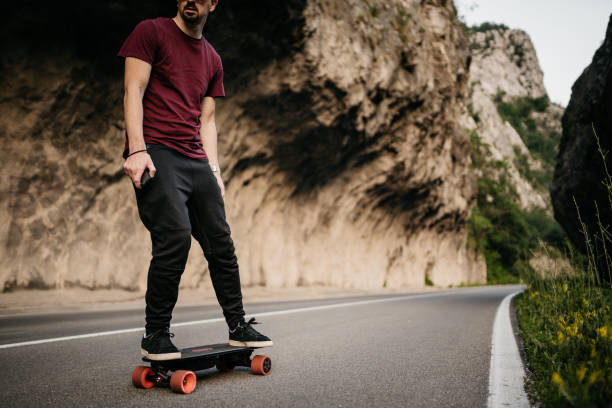 istock Man tries his electric mountainboard at sunset 1540299813