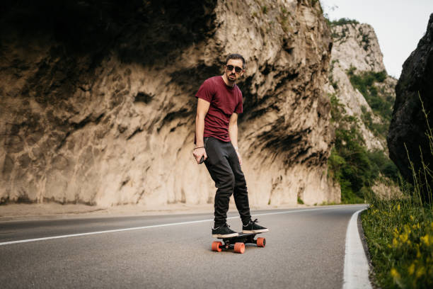 istock Man tries his electric mountainboard at sunset 1540301913