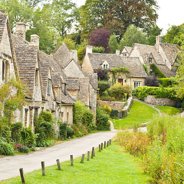 istock Houses along a small road in Bibury 154030236